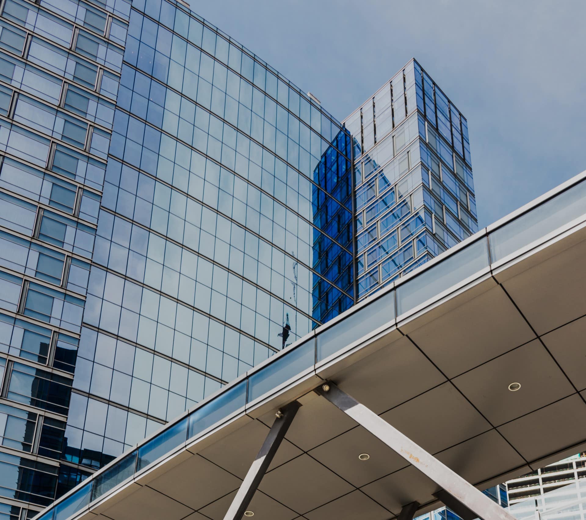 Low-angle view of modern glass skyscrapers in Québec